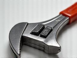 Adjustable wrench with ergonomic handle